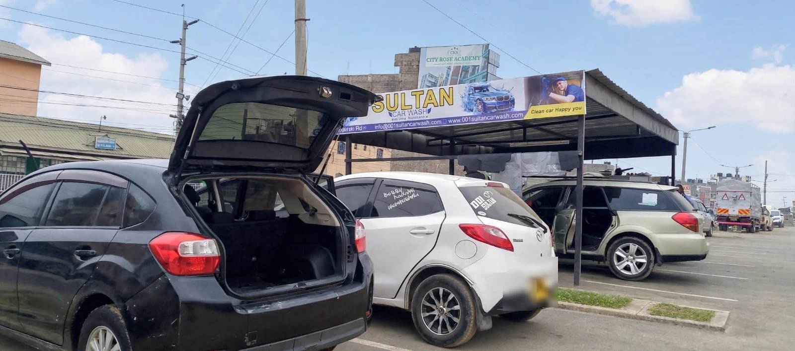001 Sultan Car Wash on a sunny day